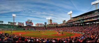 A panorama of Fenway Park during a day game