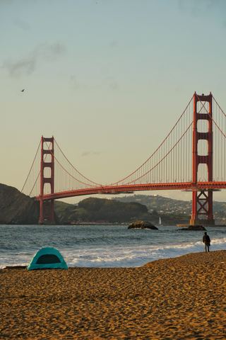 The Golden Gate Bridge at golden hour seen from Baker Beach, San Francisco